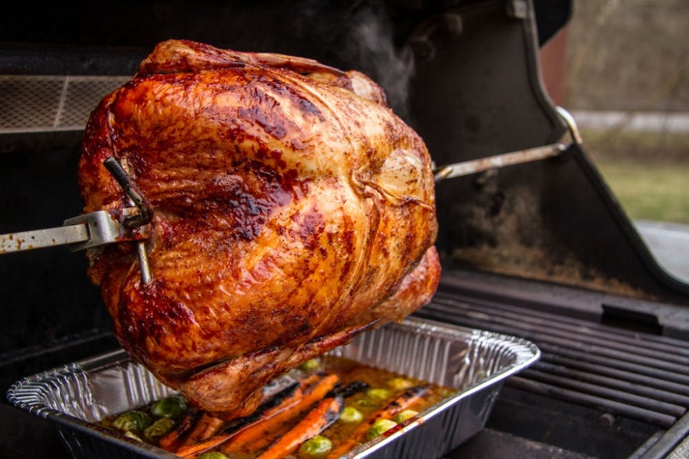 Whole turkey over drip pan - Rotisserie meat ideas - Weber Grills - Grilling Inspiration